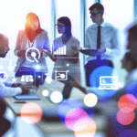 alt_text: A vibrant office scene with professionals discussing marketing automation, data, and technology.